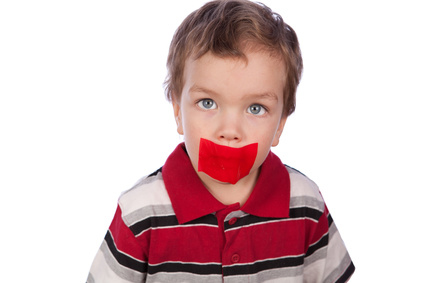 The boy's mouth by red tape
